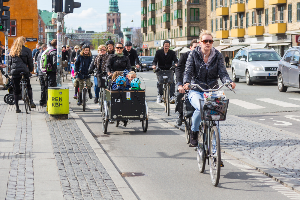 Woman riding a bike in Copenhagen